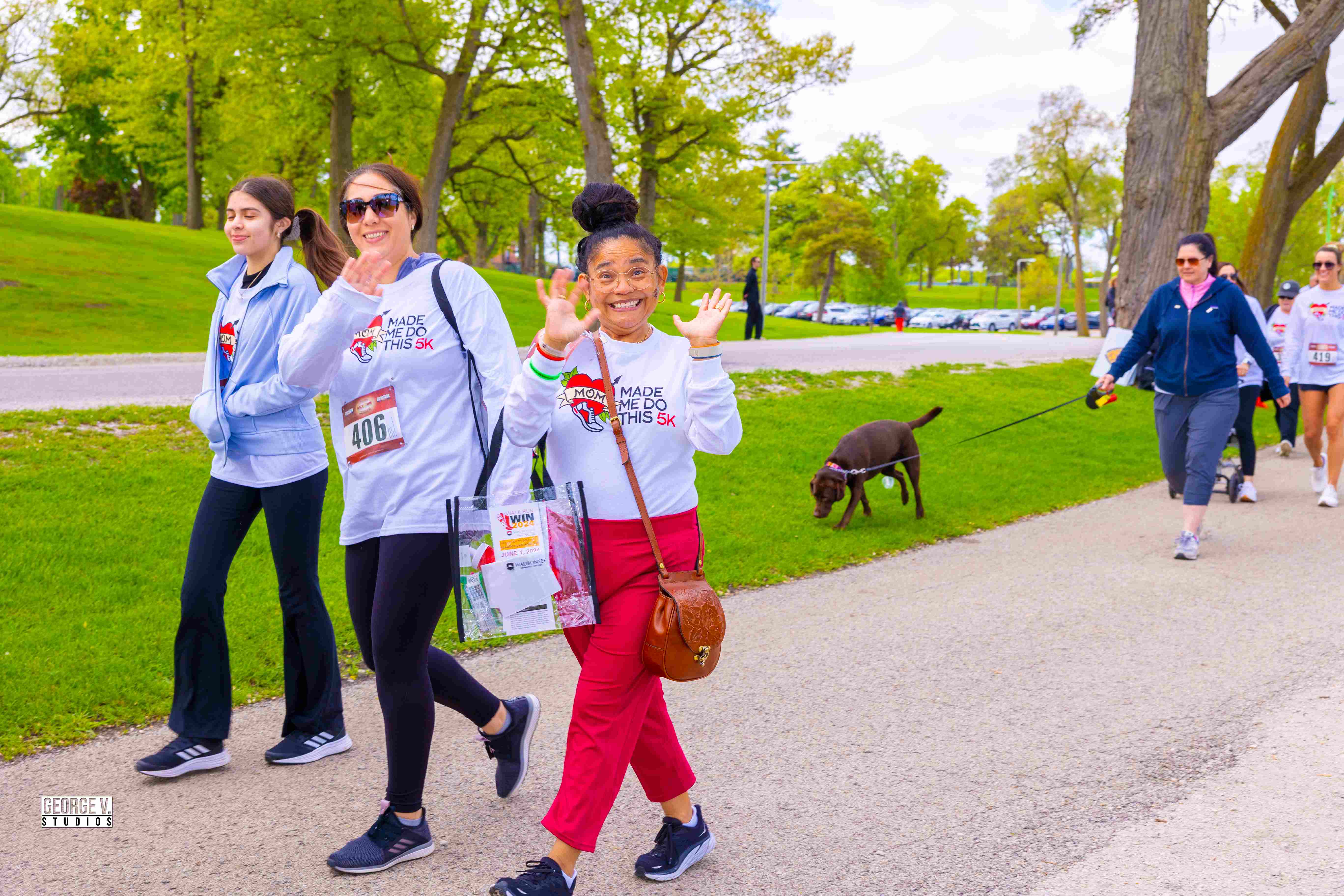 5k mom and daughters walking
