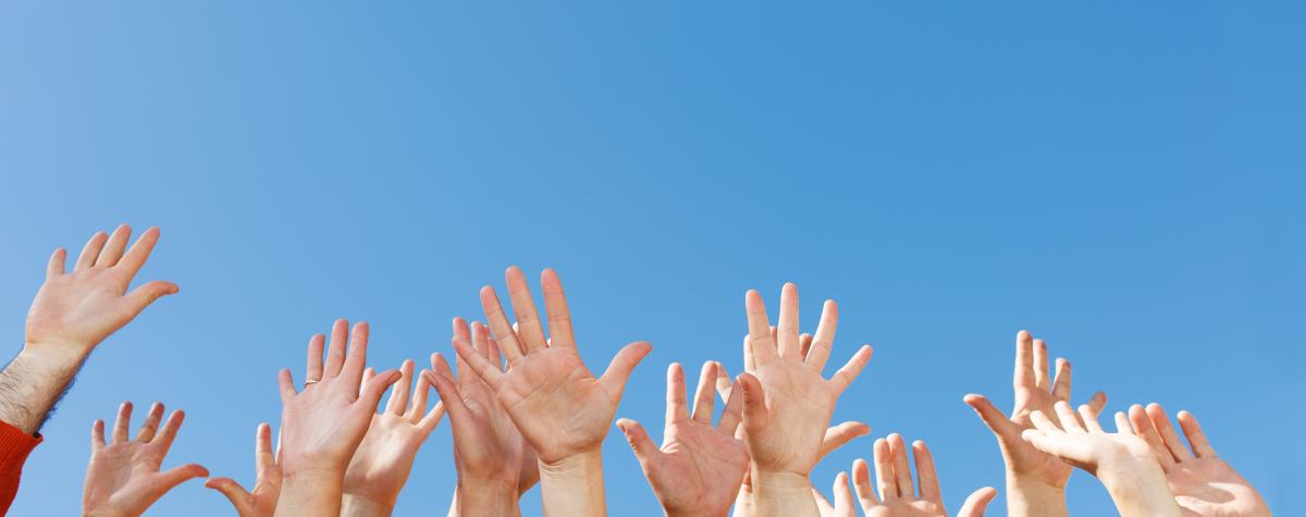 Hands Reaching Together